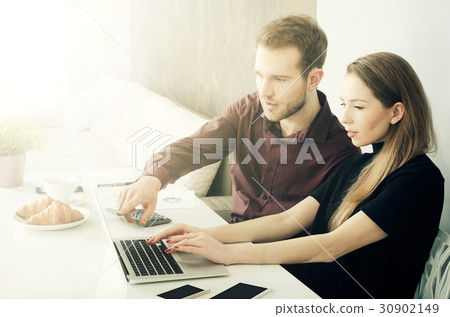 Business team working with computer in the office 30902149