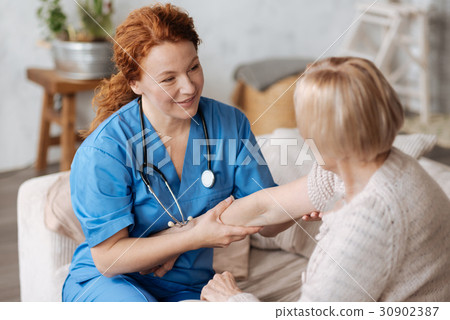 Experienced gentle private doctor testing patients 30902387