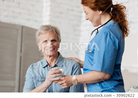 Handsome elderly man delighted with the services Handsome elderly man delighted with the services 30902622