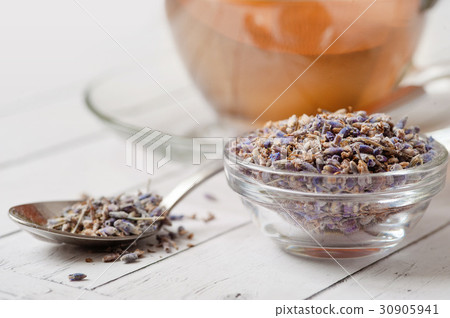 a cup of tea with fresh and dried lavender flowers a cup of tea with fresh and dried lavender flowers 30905941