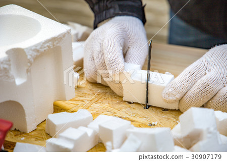 Cutting of recycled styrofoam 30907179
