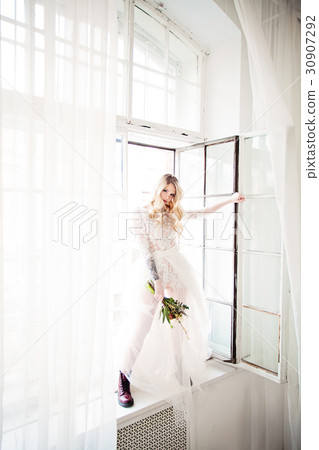 Beautiful Blonde Woman Fiancee with Hairstyle 30907292