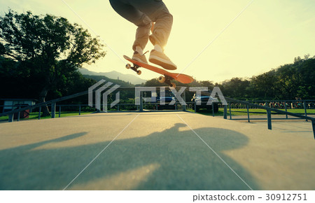 skateboarder legs skateboarding at skatepark ramp 30912751