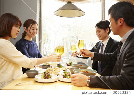 Men and women enjoying daytime drinks Men and women enjoying daytime drinks 30913324