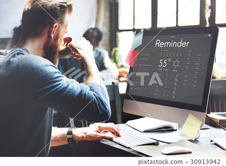 Man checking appointment on personal organizer schedule 30913942