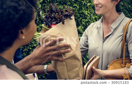 People Buying Vegetable From Shop at Market 30915183