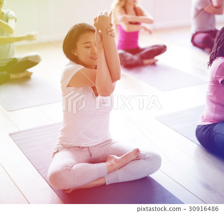 People are learning and sitting on mats People are learning and sitting on mats 30916486