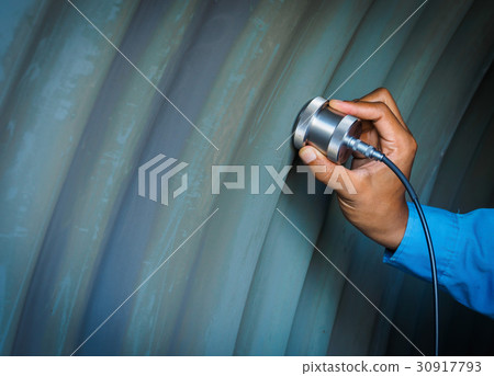 Inspector use ultrasonic testing machine 30917793