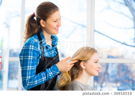 hairdresser and client 30918558