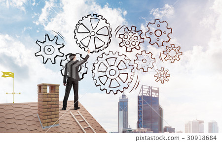 Mister boss on brick roof standing with back and draw teamwork concept. Mixed media 30918684