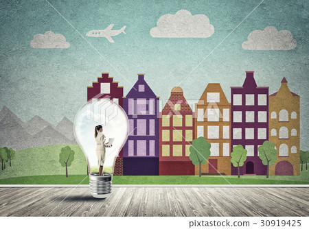 Businesswoman trapped in bulb Businesswoman trapped in bulb 30919425