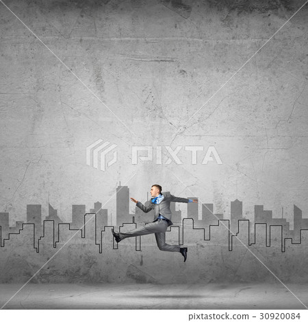 Businessman jumping high 30920084