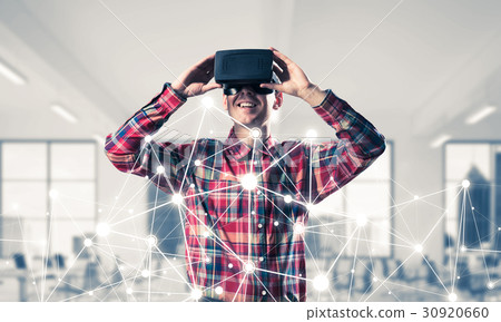 Guy wearing checked shirt and virtual mask demonstrating some emotions 30920660