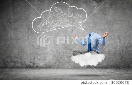 Headless businessman meditating 30920678