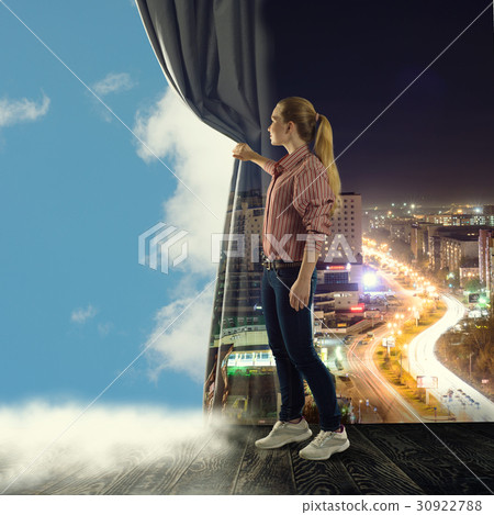 young woman pushes the curtain looking at clouds young woman pushes the curtain looking at clouds 30922788
