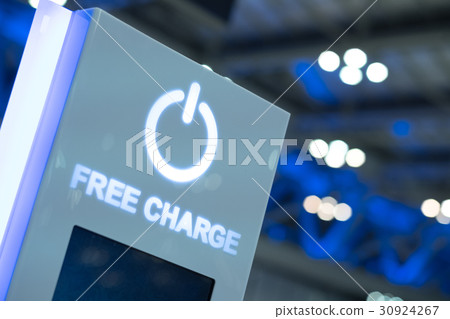Free charging station in modern airport 30924267