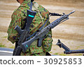 Ground Self Defense Force person carrying 89 type rifle 30925853