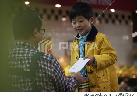 Boy and male clerk to do some work Boy and male clerk to do some work 30927550