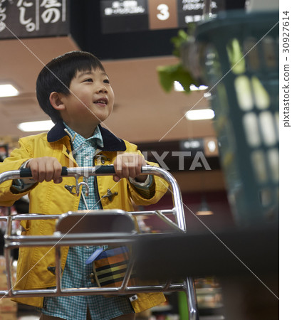 A boy making an impatient payment A boy making an impatient payment 30927614