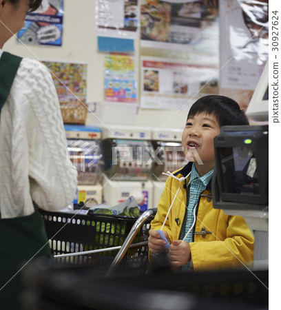 A boy making an impatient payment A boy making an impatient payment 30927624