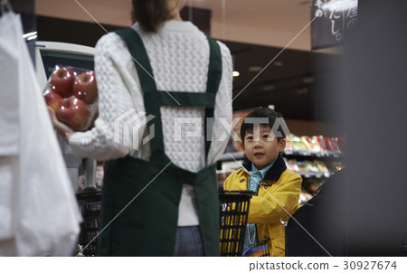 A boy making an impatient payment A boy making an impatient payment 30927674