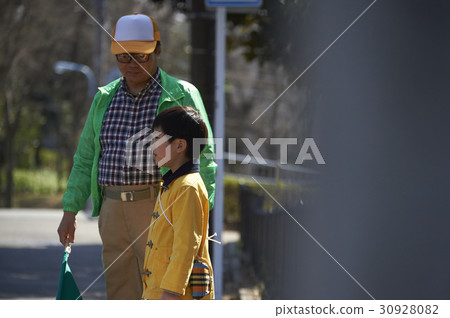 A boy crossing an obstacle crosswalk 30928082