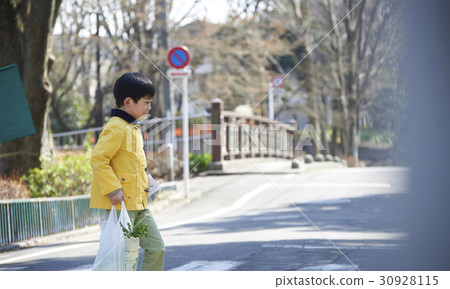 A boy crossing an obstacle crosswalk 30928115