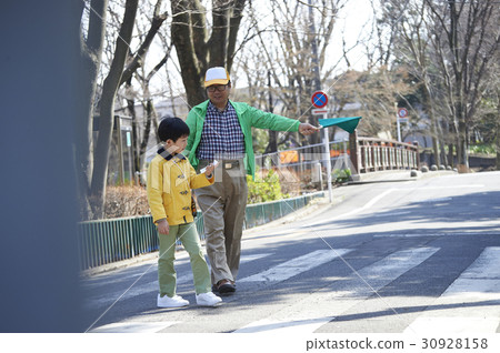 A boy crossing an obstacle crosswalk 30928158