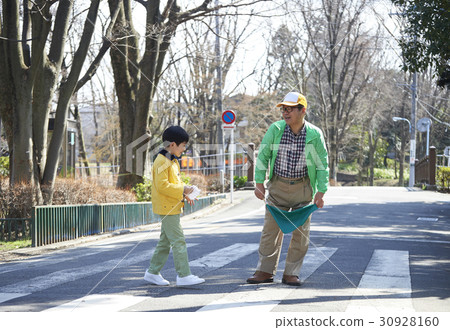 A boy crossing an obstacle crosswalk 30928160