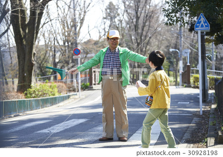 A boy crossing an obstacle crosswalk 30928198