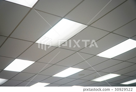 White ceiling with neon light bulbs in uprisen vie 30929522