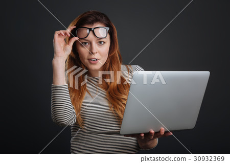 Pretty emotional girl looking fascinated 30932369