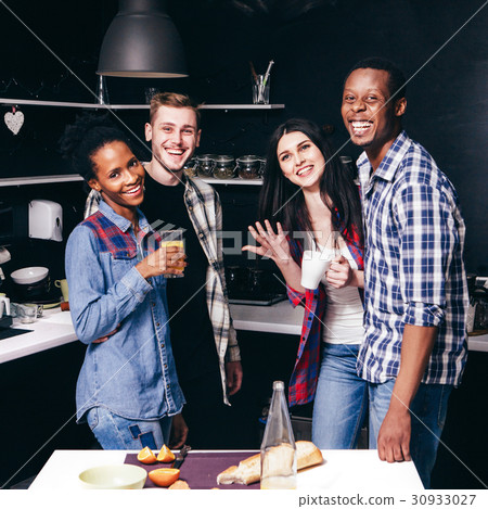 Happy friends at kitchen, two interracial couples 30933027