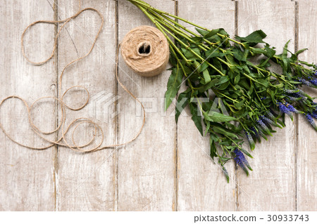 Workplace with wildflower and rope flat lay Workplace with wildflower and rope flat lay 30933743