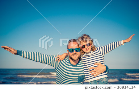 Happy family on summer vacation Happy family on summer vacation 30934134