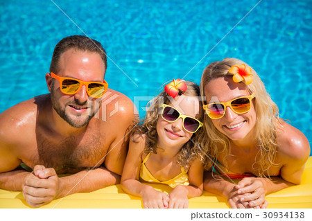 Happy family having fun on summer vacation 30934138