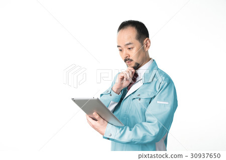 Middle men in work clothes 30937650