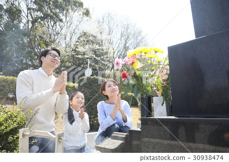 a visit to a grave  30938474