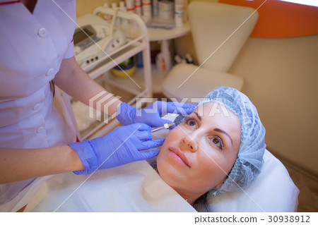 doctor beautician increases lip patient an doctor beautician increases lip patient an 30938912