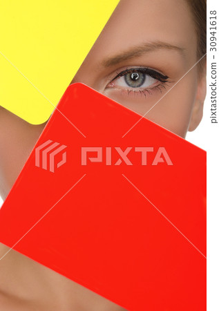 face of beautiful woman with red and yellow soccer card face of beautiful woman with red and yellow soccer card 30941618