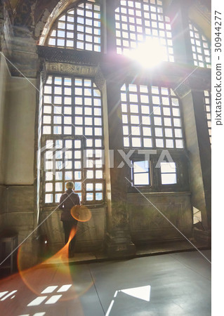 Silhouette of a woman on the window. Haze and 30944277