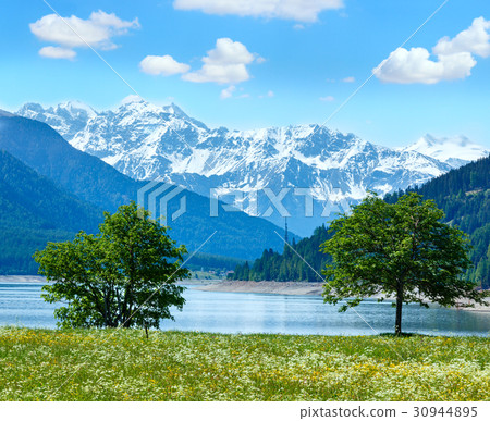 Reschensee summer landscape (Italy). 30944895