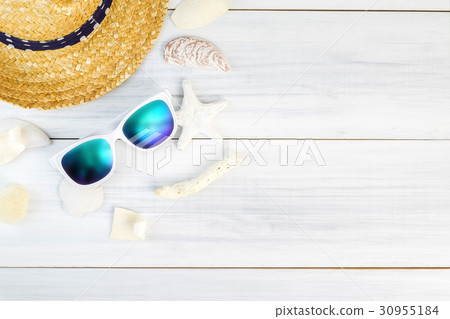 Summer Beach accessories on wood table Summer Beach accessories on wood table 30955184