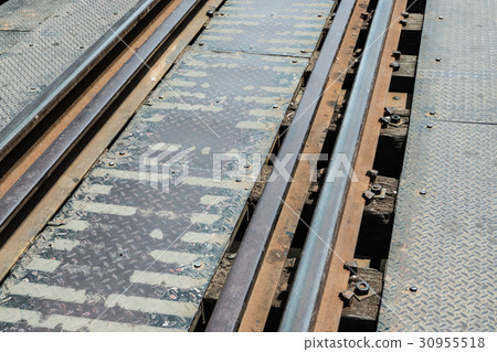 Close up of railway with steel plate walkway 30955518