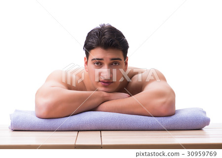 Handsome man in spa massage concept Handsome man in spa massage concept 30959769