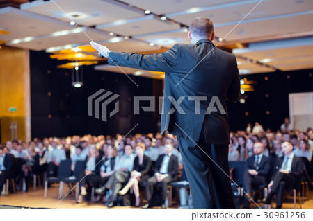Speaker giving talk at business conference event 30961256