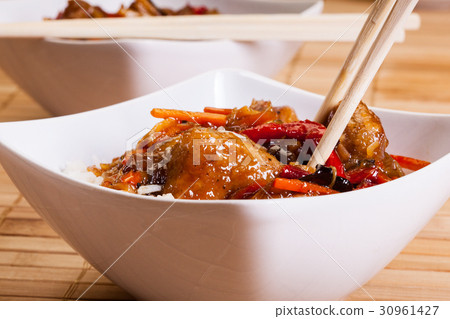 Sweet and sour chicken with rice 30961427