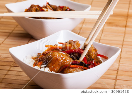 Sweet and sour chicken with rice 30961428