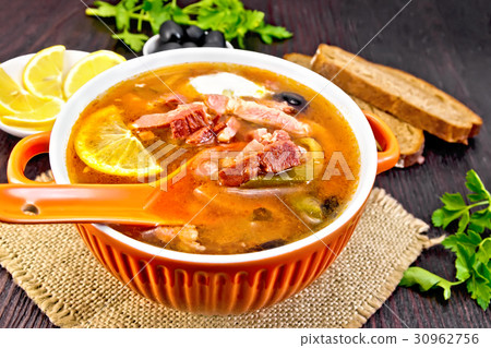 Solyanka in bowl on dark board 30962756