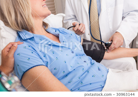 Senior Woman Hospital Blood Pressure Check  30963144